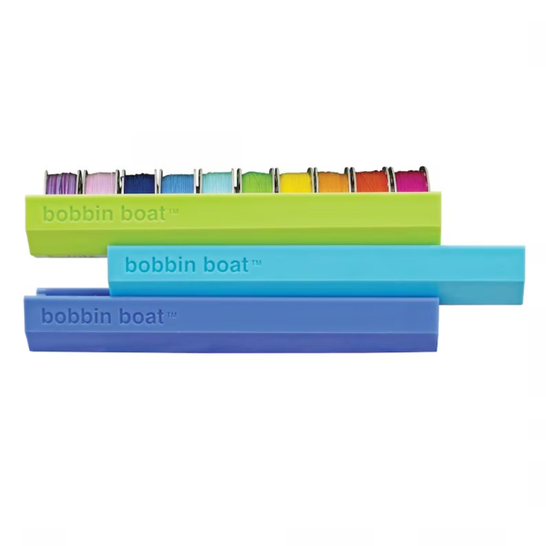 Dritz Bobbin Boat available in 3 different colors